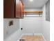 Laundry room with washer hookups, and wood shelf at 21343 Reindeer Rd, Christmas, FL 32709