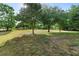 Expansive lot with mature trees and a serene, park-like setting, perfect for recreation and enjoying nature at 21343 Reindeer Rd, Christmas, FL 32709