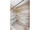 Walk-in shower with custom tile, a built-in bench, and adjustable shower head at 21343 Reindeer Rd, Christmas, FL 32709