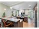 Bright eat-in kitchen with granite countertops, stainless steel appliances and view to backyard at 2305 S Magnolia Ave, Sanford, FL 32771