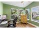 Bright office space with three windows offering verdant views of the outdoors at 2305 S Magnolia Ave, Sanford, FL 32771