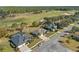 Aerial view of a well maintained home in a desirable neighborhood with mature landscaping and a golf course view at 23533 Valderama Ln, Sorrento, FL 32776