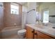Cozy bathroom with a bathtub, shower curtain, and a vanity with a sink and mirror at 23533 Valderama Ln, Sorrento, FL 32776