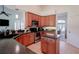 Modern kitchen with ample cabinet space, stainless steel appliances, and a breakfast nook for casual dining at 23533 Valderama Ln, Sorrento, FL 32776