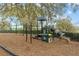Community playground offers play structures, a slide, and swings in a safe and fun environment at 23533 Valderama Ln, Sorrento, FL 32776
