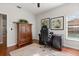 Bedroom with a desk area, hardwood floors, natural light and closet at 240 Promenade Cir, Lake Mary, FL 32746