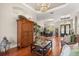 Elegant living room featuring hardwood floors and view to dining room at 240 Promenade Cir, Lake Mary, FL 32746