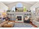 Bright living room featuring stylish décor, fireplace, and large windows at 240 Promenade Cir, Lake Mary, FL 32746