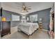 Neutral bedroom featuring a ceiling fan and natural light from the window at 2510 Kiowa Trl, Fern Park, FL 32730