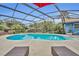 Sparkling pool area inside a screen enclosure, perfect for relaxation and recreation at 2510 Kiowa Trl, Fern Park, FL 32730