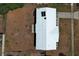 Aerial straight-down view of a house with a white roof and a brown yard at 3212 Acoma Dr, Orlando, FL 32829