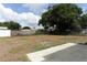 Large backyard featuring a concrete patio and mixed fencing at 3212 Acoma Dr, Orlando, FL 32829