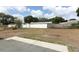 Large backyard featuring a concrete patio and mixed fencing at 3212 Acoma Dr, Orlando, FL 32829