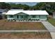 Charming single-story home with a white roof and xeriscaped front yard at 3212 Acoma Dr, Orlando, FL 32829