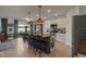 Open kitchen with island, white cabinetry, and stainless steel appliances at 4054 Silverstream Ter, Sanford, FL 32771