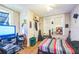 Funky bedroom area with unique decorations, and a comfortable bed at 419 Palm Ave, Eustis, FL 32726
