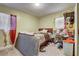 Bedroom with bed and disorganized closet at 4201 Chantelle Rd, Orlando, FL 32808