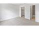 Neutral carpeted bedroom with large closets, and easy access to an en suite bathroom at 445 Cottonwood Dr, Altamonte Springs, FL 32714