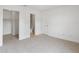 Clean bedroom with neutral carpet, a closet, an ensuite bathroom, and ample natural light at 445 Cottonwood Dr, Altamonte Springs, FL 32714