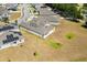 Overhead view of the backyard with new construction home with solar panels at 4459 Bluff Oak Loop, Kissimmee, FL 34746