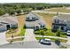 Aerial view of a two-story home with landscaped yard at 4459 Bluff Oak Loop, Kissimmee, FL 34746