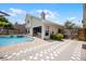 Inviting backyard pool and spa area with patio, mature landscaping and a view of the home's exterior at 479 Cidermill Place, Lake Mary, FL 32746
