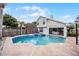 Lovely backyard pool and spa with a beautiful blue sky and an open patio area at 479 Cidermill Place, Lake Mary, FL 32746