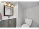 Well-lit bathroom featuring a modern vanity, sink, and fixtures at 479 Cidermill Place, Lake Mary, FL 32746