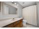 This bathroom features a single sink vanity and shower/tub combo at 479 Cidermill Place, Lake Mary, FL 32746