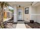 Inviting front porch with concrete walkway, mature tree, and stylish front door at 479 Cidermill Place, Lake Mary, FL 32746