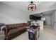 Finished basement area features an arcade game, kitchenette, and retro-style seating at 479 Cidermill Place, Lake Mary, FL 32746