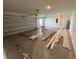 Spacious two-car garage with ample storage and potential for a workshop area at 4891 Lyric Dr, Mascotte, FL 34753