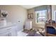 Charming mud room boasts natural light, a washing station, and custom canine-themed décor at 4891 Lyric Dr, Mascotte, FL 34753