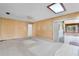 Well-lit living room features carpet floors and a sliding door to the patio at 715 Roughbeard Rd, Winter Park, FL 32792