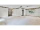 View of a living room with carpet floors and access to other rooms in the home at 715 Roughbeard Rd, Winter Park, FL 32792