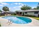 Inviting backyard pool with modern updates and an expansive outdoor space at 715 Roughbeard Rd, Winter Park, FL 32792