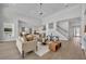 Spacious living room showing the open floor plan, hardwood floors, and staircase at 731 Williams Dr, Winter Park, FL 32789