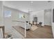 Upstairs living area features a cozy sitting area and ample natural light from multiple windows at 731 Williams Dr, Winter Park, FL 32789