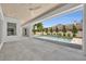 Open-air pool area featuring tiled flooring, a sparkling pool, and a white plank ceiling at 731 Williams Dr, Winter Park, FL 32789