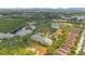 An aerial perspective of a condo complex featuring low-rise buildings and verdant surroundings at 8908 Legacy Ct # 303, Kissimmee, FL 34747