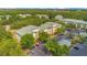 Aerial shot of a low-rise condo complex with lush landscaping and convenient parking at 8908 Legacy Ct # 303, Kissimmee, FL 34747