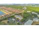 A sprawling residential community with mature trees, lakes, and well-maintained buildings at 8908 Legacy Ct # 303, Kissimmee, FL 34747