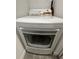 Modern dryer in corner of laundry room at 8908 Legacy Ct # 303, Kissimmee, FL 34747