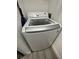 Modern washing machine in corner of laundry room at 8908 Legacy Ct # 303, Kissimmee, FL 34747