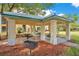 Outdoor picnic area with a grill for residents to enjoy casual meals and gatherings at 8908 Legacy Ct # 303, Kissimmee, FL 34747