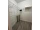 Bright walk-in closet with ample storage space and wooden floor at 8908 Legacy Ct # 303, Kissimmee, FL 34747