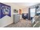 This themed bedroom features a bunk bed, wall decor, and gray dresser at 8993 Cabot Cliffs Dr, Davenport, FL 33896