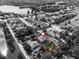 Aerial view of a home highlighting the lot size, landscaping, and neighborhood layout near a lake at 913 Bending Oak Trl, Winter Garden, FL 34787