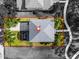 Aerial view of property with screened-in lanai, backyard, and surrounding landscaping at 913 Bending Oak Trl, Winter Garden, FL 34787