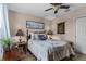 Bedroom with natural light, and decorated with a boat painting at 913 Bending Oak Trl, Winter Garden, FL 34787